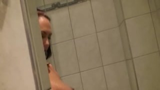 Kinky girlfriend displays her goods while showering