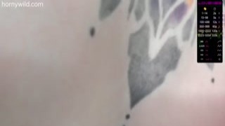 Tattooed babe masturbates her tasty pussy